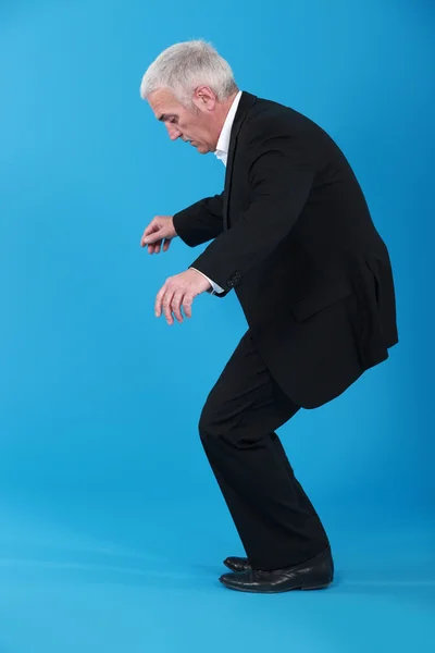 Um homem de negócios a dançar . — Fotografia de Stock