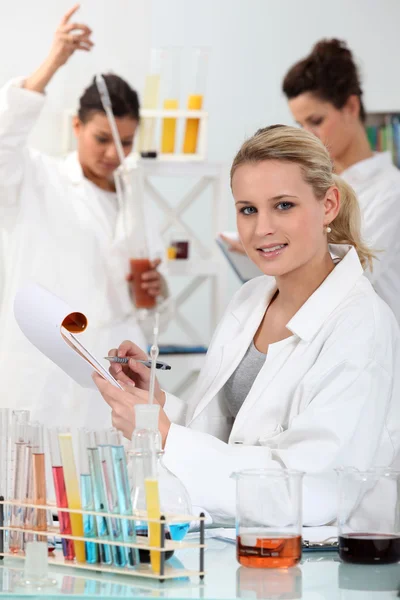 Three women in laboratory — Stock Photo, Image