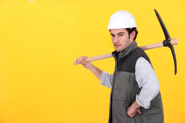 Confident worker with pick-axe — Stock Photo, Image