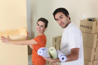 Couple decorating home clipart