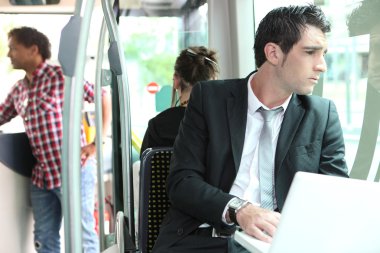 Businessman on the bus clipart