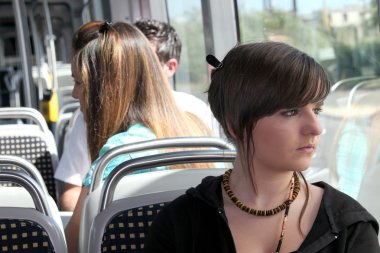 Young person on the tram clipart