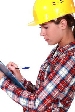 A female foreman with a clipboard. clipart