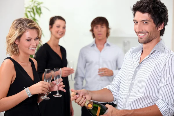 Popping the champagne — Stock Photo, Image