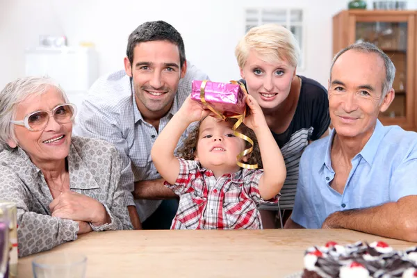 Little girl celebrating her birthday with all her family — Stock Photo, Image