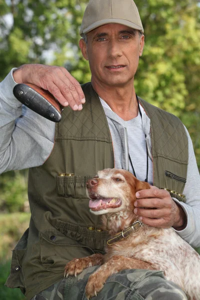 stock image Hunter with shotgun and spaniel