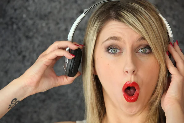 Woman listening to loud music — Stock Photo, Image