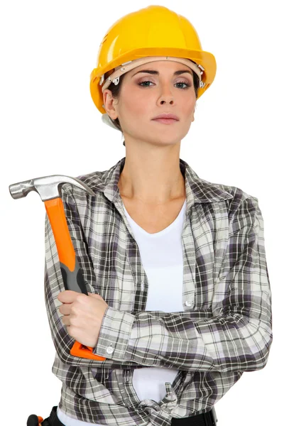 Vrouw bedrijf hamer — Stockfoto