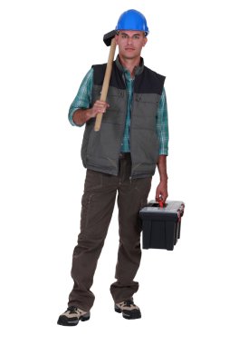 Portrait of a tradesman arriving at work clipart