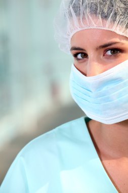 Nurse wearing surgical mask clipart