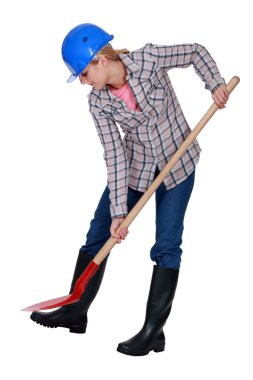 Woman digging with a shovel clipart