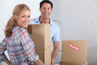 Couple moving boxes clipart