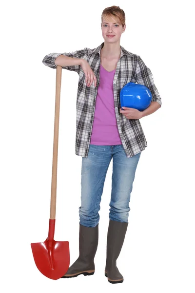 Potrait of a tradeswoman with her shovel — Stock Photo, Image