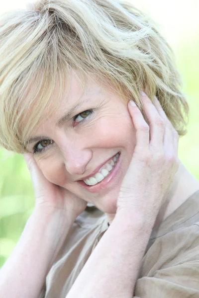 Closeup of radiant smiling woman — Stock Photo, Image
