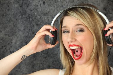 Woman having fun singing loudly clipart