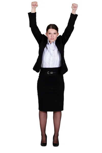 Empresária levantando as mãos — Fotografia de Stock