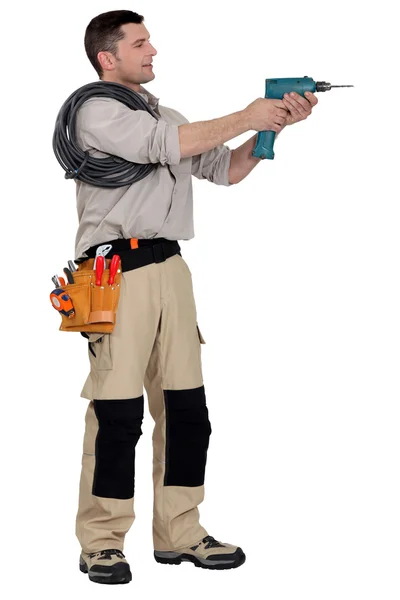 Electrician with a drill — Stock Photo, Image