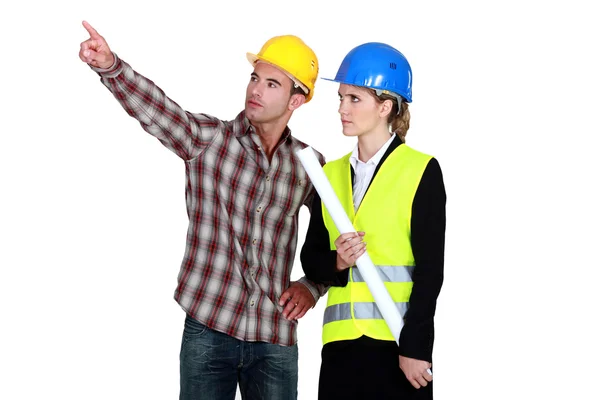 Fore man pointing next to architect — Stock Photo, Image