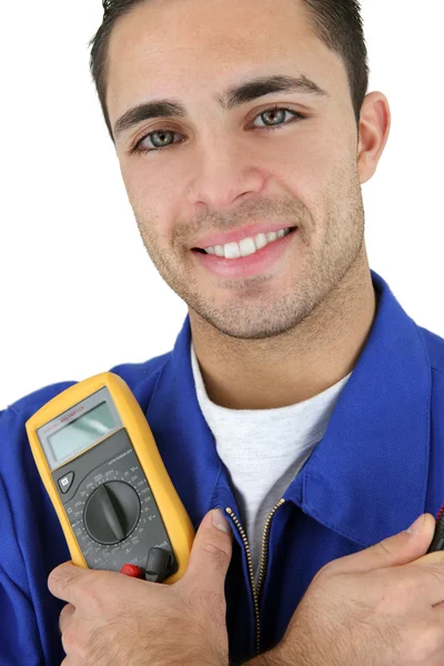Young electrician smiling on white background — Stock Photo, Image