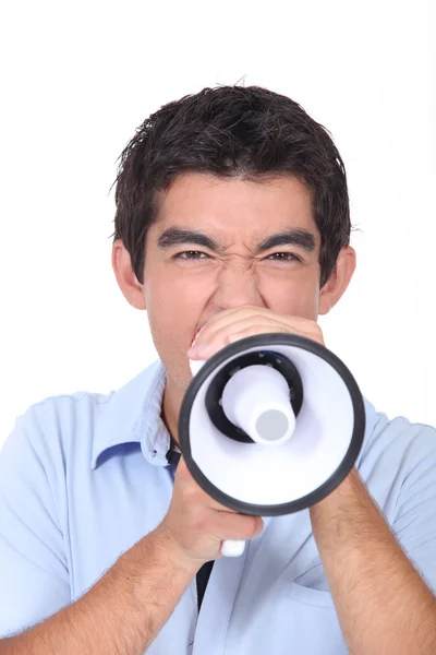 Adolescente gritando em alto-falante — Fotografia de Stock