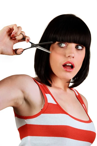 Brunette with scissors — Stock Photo, Image