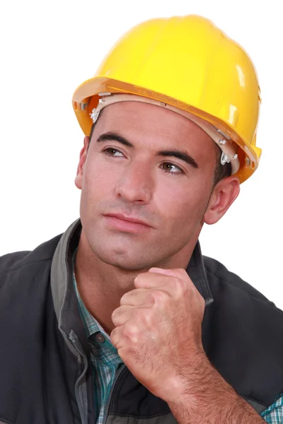Constructor sosteniendo puño apretado — Foto de Stock