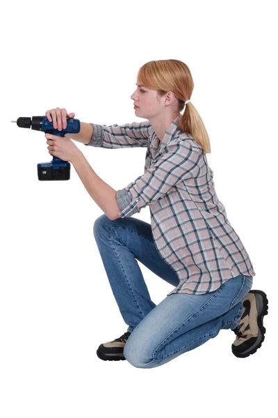 Female wall drilling — Stock Photo, Image