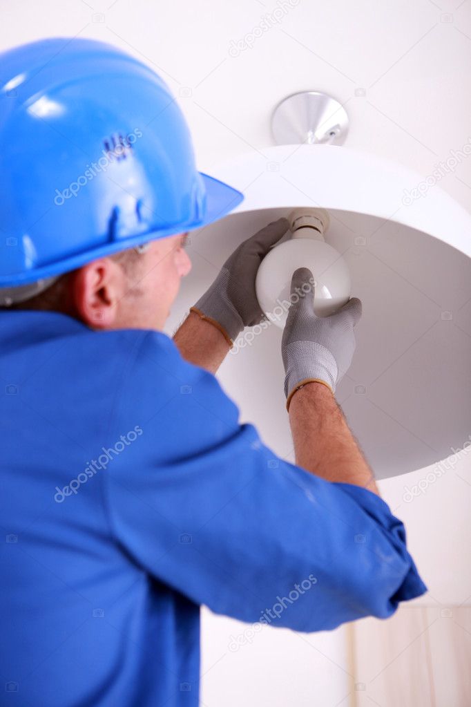 Electrician Ing A Ceiling Light