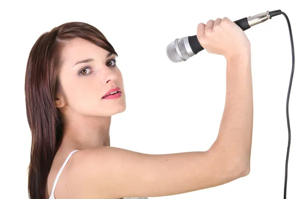 Chica joven sosteniendo micrófono —  Fotos de Stock