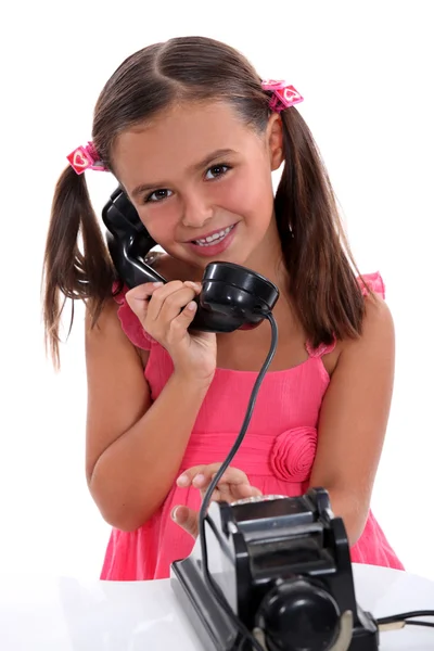 Дівчина з вінтажним телефоном — стокове фото