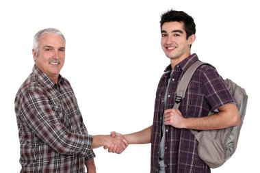 Men handshaking clipart