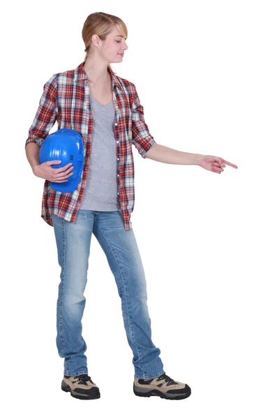 Female builder directing attention — Stock Photo, Image