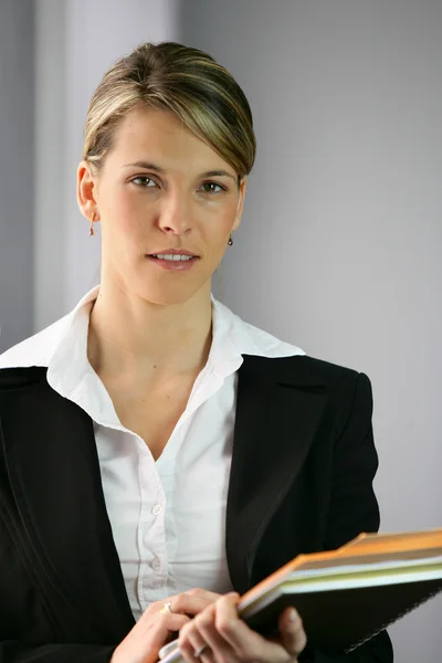 Blond lawyer holding case study — Stock Photo, Image