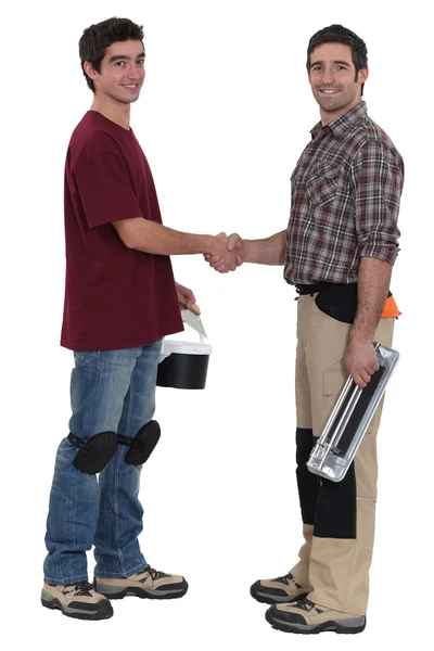 Two decorators greeting each other — Stock Photo, Image