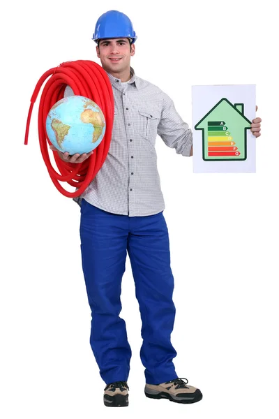 Artigiano con globo e pannello di valutazione energetica — Foto Stock