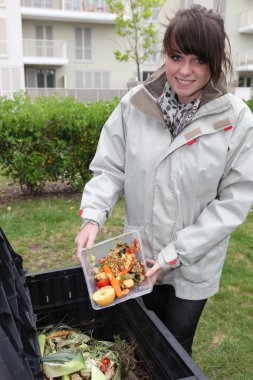 Young woman throwing out the garbage clipart