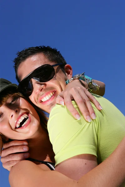 Embraced couple laughing — Stock Photo, Image