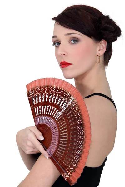 Испанская танцовщица держит вентилятор — стоковое фото