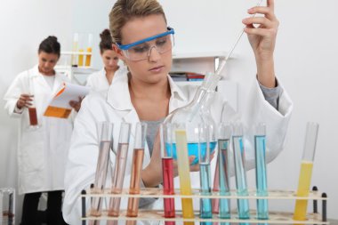 Three women in science laboratory clipart