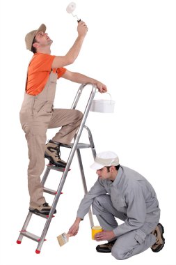 Craftsmen painting together clipart