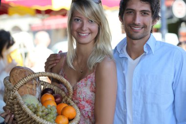 Couple at the market clipart