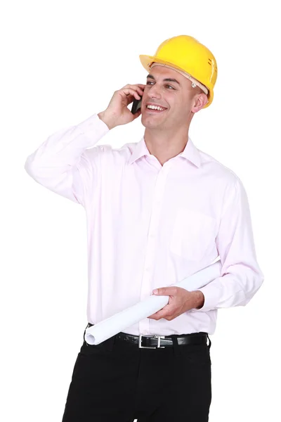 An architect chatting over the phone. — Stock Photo, Image