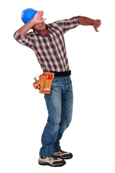 Craftsman trying to protect himself — Stock Photo, Image