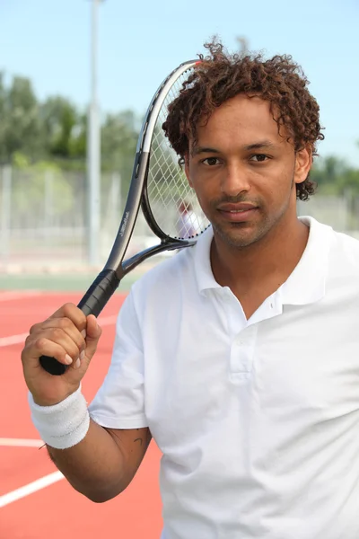 Tennis player with racket — Stock Photo, Image