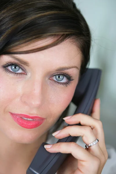 Close-up of brunette on the phone — Stock Photo, Image