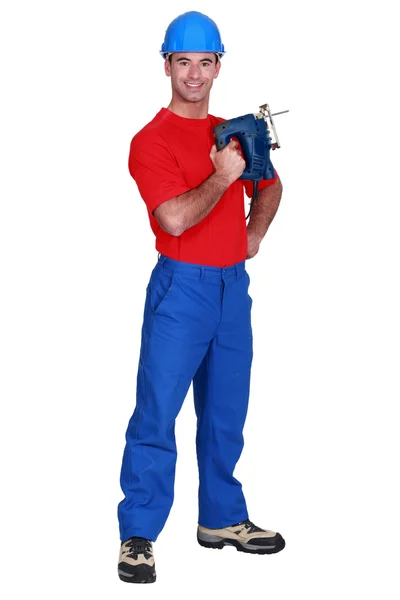 Carpenter holding band-saw — Stock Photo, Image