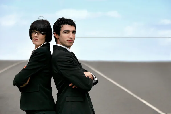 Two businesspeople stood on runway — Stock Photo, Image