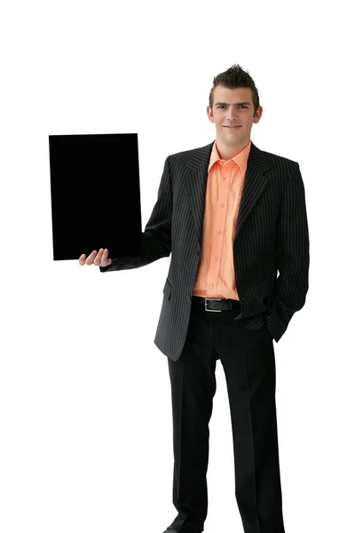 Confident young salesman stood with placard — Stock Photo, Image