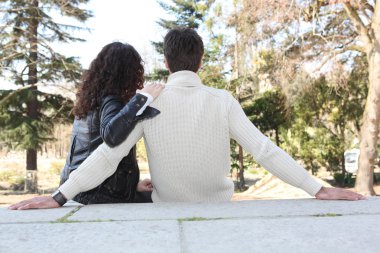 Couple in love sitting clipart