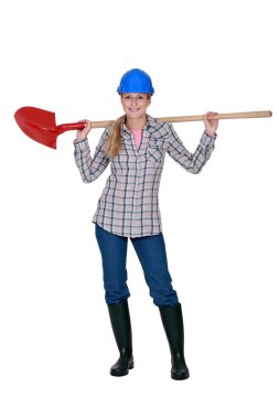 Woman with a shovel clipart